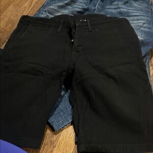 Black Levi’s Button-Fly Jean shorts 36